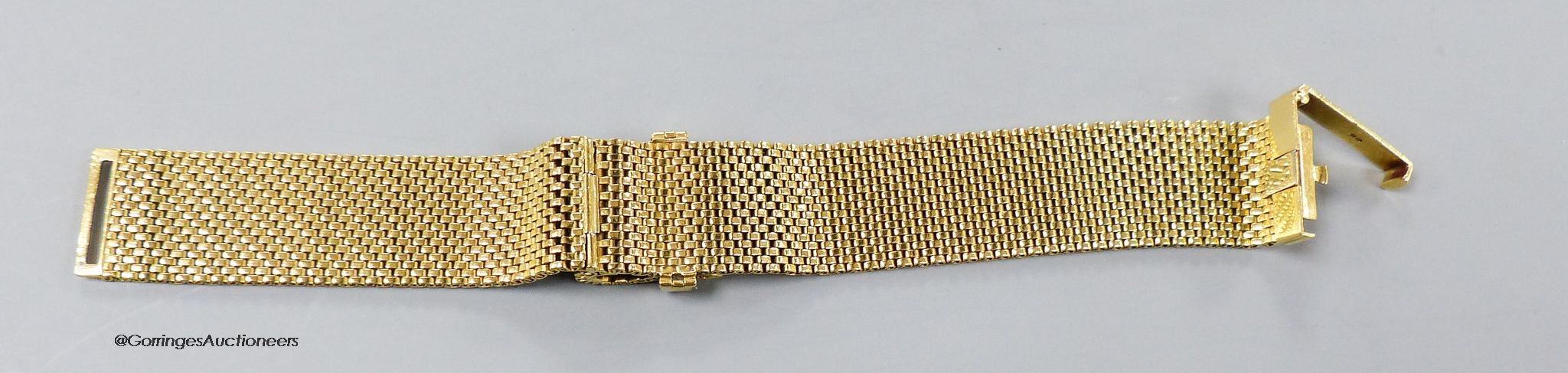 An 18ct gold woven brick link bracelet. overall 17.8cm, 74.5 grams.